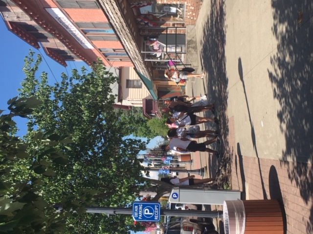 busy canada street shown on a sunny day in lake george, ny