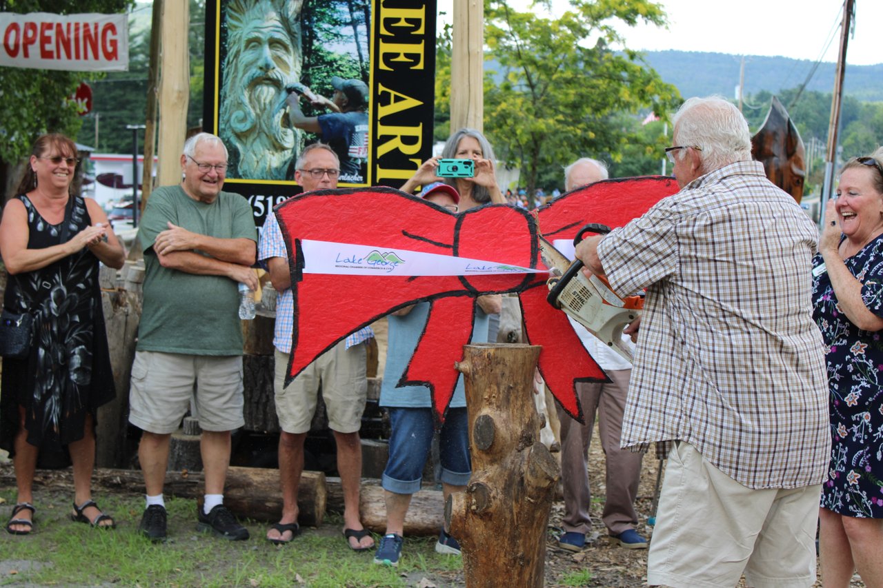 Chainsaw “Ribbon Cutting“ at Opening of Adirondack Carvers Co-op